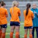  Nicole Lukic talks to Aurora players during a training session at TCO Stadium.