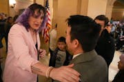 Rep. Leigh Finke, DFL-St. Paul, thanked Hao Nguyen of Minneapolis for being supportive of his transgender child as she recounted her own experiences f