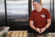 Megan Berray-Larsen hand rolls and twists her bagels in a Minneapolis commercial kitchen. She started Mogi Bagel, a cottage industry bagel business, i