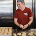 Megan Berray-Larsen hand rolls and twists her bagels in a Minneapolis commercial kitchen. She started Mogi Bagel, a cottage industry bagel business, i