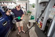 Scott McEachern pumped gas — going for $3.39 a gallon — at the 36 Lyn Refuel Station in Minneapolis.
