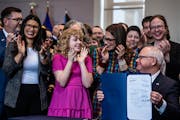 Hildie Edwards, 13, attended the signing in April of a bill protecting gender-affirming health care in Minnesota. 