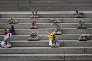 Boots placed on the steps of the State Capitol remember Minnesota soldiers and veterans who died by suicide. 