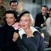 Marilyn Monroe (center, in “Gentlemen Prefer Blondes with Jane Russell) is one of the real-life characters in “The Enchanters.”