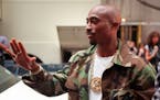 Rapper Tupac Shakur, shown in this Sept. 4, 1996, photo, was shot several times while riding in a car after a Mike Tyson-Bruce Seldon boxing match in 