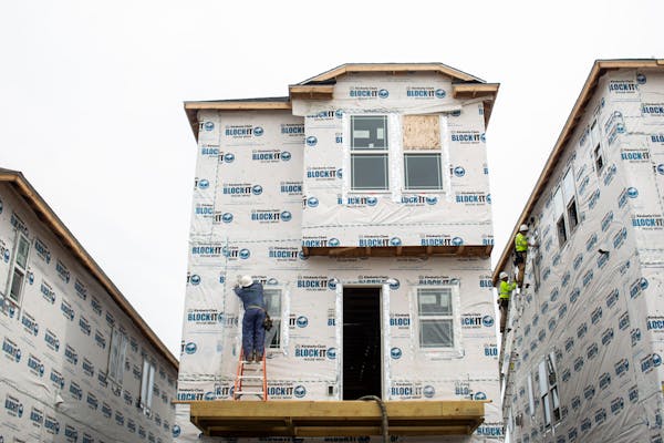 Money from an envisioned set of fee hikes for electricity and gas in Minneapolis could fund weatherization projects, including insulating older homes.