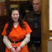 FILE - Taylor Schabusiness returns to a Brown County courtroom after attacking her attorney Quinn Jolly, during a hearing in Green Bay, Wis., Feb. 14,