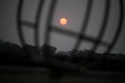 Wildfire smoke made for a hazy sunset May 16 in the metro.