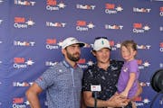 Erik van Rooyen, left, and Alex Gaugert reflected on their two rounds together at the 3M Open in Blaine. Gaugert’s daughter, Annika, was along for t