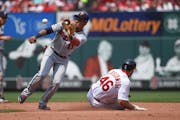 Jorge Polanco tried to get a tag on Paul Goldschmidt when the Twins visited St. Louis in 2021.
