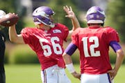 Yes, that was Kirk Cousins in the baggy No. 66 jersey at Vikings practice on Tuesday.