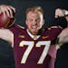 Quinn Carroll, shown posing for a portrait, went from Edina to Notre Dame and now is back in Minnesota, this season as a right guard for the Gophers.