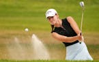 Kathryn VanArragon (shown in the girls golf state tournament at Bunker Hills Golf Club in June) shot a 4-under-par 68 in Tuesday’s second and final 