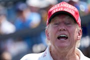 Former President Donald Trump reacts during the first round of the Bedminster Invitational LIV Golf tournament in Bedminster, N.J., on Friday.