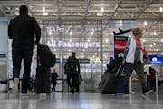 Travelers head to TSA at Terminal 1 last year at the Minneapolis-St. Paul International Airport.