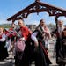 Festive Norwegians celebrated the Syttende Mai (17th of May) holiday on the Old Town Bridge in Trondheim.