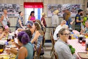 People lined up for breakfast inside Hamline Church Dining Hall on Thursday, the opening day of the Minnesota State Fair in Falcon Heights.