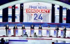 Republican presidential candidates at the debate hosted Wednesday by Fox News (from left): former Arkansas Gov. Asa Hutchinson; former New Jersey Gov.