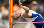 Markus Rooth, of Norway, clears the bar in an early attempt in the decathlon high jump during the World Athletics Championships in Budapest, Hungary, 