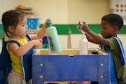 Students Isla Alwine, left, and Eli Obazeluwa played at the soap station in the class of 2-year-olds at Primrose School in Champlin Park. The school h