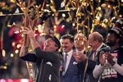 Georgia head coach Kirby Smart, left, celebrated victory in the College Football Playoff championship on Jan. 9 at SoFi Stadium in Inglewood, Calif.