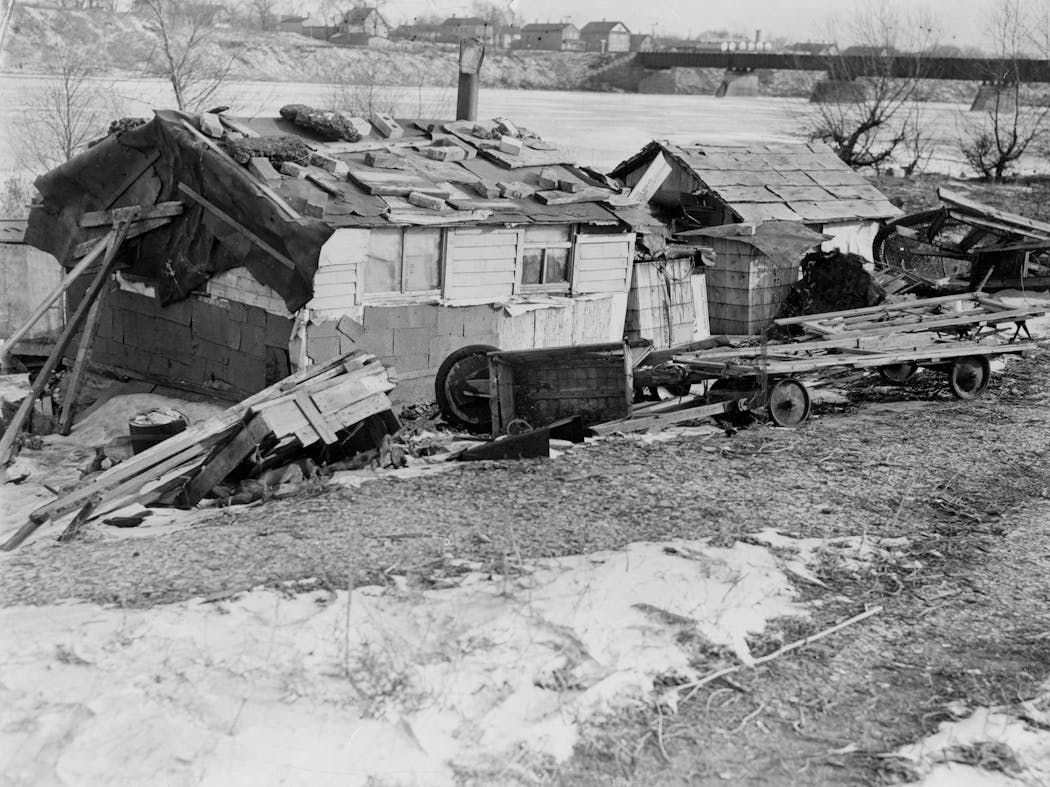 Makeshift dwellings in 'Hoovertown' alongside the Mississippi River in 1938.