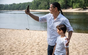 Learning on the go James Vukelich Kaagegaabaw and son Jack record an Ojibwe Word of the Day video along the Mississippi River, or Misi-ziibi.