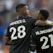 Minnesota United forwards Mender García (28) and Bongokuhle Hlongwane (21) celebrated after a goal against the Portland Timbers on July 1 at Allianz 