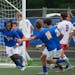 Wayzata midfielder Eddy Ignatius (7) celebrated with teammates after scoring a goal in the first half against Washburn.