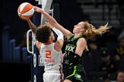 Lynx forward Dorka Juhász defended against Sun guard Natisha Hiedeman when the two teams met back in June. The Lynx-Sun playoff series begins Wednesd