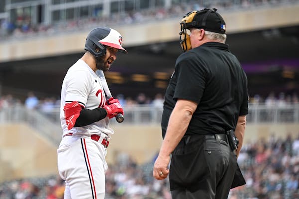 Joey Gallo of the Twins argued a strikeout call with umpire Bill Miller on July 25 at Target Field.