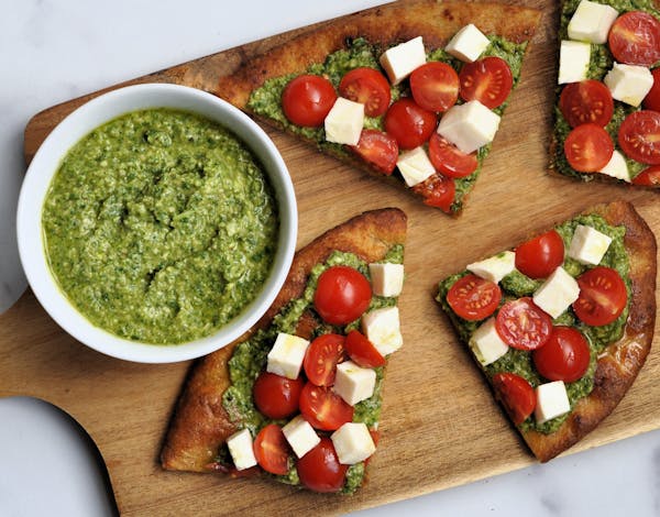 Experiment with ingredients when making pesto. This version uses arugula and walnuts instead of the traditional basil and pine nuts. 