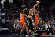 Lynx forward Napheesa Collier (24) blocked a shot by guard DiJonai Carrington (21) in a June 22 game at Target Center. The Sun have won nine of the te