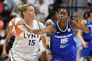 Connecticut’s Tiffany Hayes, right, tried to steal Lynx point guard Rachel Banham on Sunday.