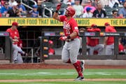 Former Twins prospect Christian Encarnacion-Strand rounded the bases after hitting a two-run home run for the Reds during the eighth inning against th