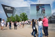 Fans wait for doors to open on June 23, 2023, for the first of two Taylor Swift concerts outside U.S. Bank Stadium in Minneapolis. The events caused s