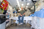 John Sauer, a cardiac arrest survivor, posed inside a first-of-its-kind ambulance operated by the Minnesota Mobile Resuscitation Consortium. Sauer, 62