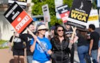 Meredith Stiehm, left, president of Writers Guild of America West, and Fran Drescher, president of SAG-AFTRA, take part in a rally by striking writers