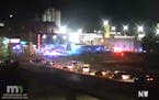 Footage from a Minnesota Department of Transportation traffic camera showed a heavy police presence outside the 4th Street Saloon after sunset on Wedn