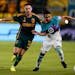 Minnesota United’s Emanuel Reynoso, right, and the L.A. Galaxy’s Tyler Boyd vied for the ball Wednesday night in Carson, Calif. The Galaxy won 4-3