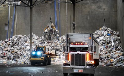 Waste is trucked in before being going into a boiler and being converted into energy at the Hennepin Energy Recovery Center, or HERC, in February 2023