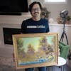 Ryan Nelson, a Minnesota art dealer, holds “A Walk in the Woods,” the very first painting Bob Ross painted on air.