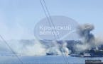 This image taken from UGC video shows smoke rising from the headquarters of Russia’s Black Sea Fleet in Sevastopol, Crimea, Friday Sept. 22, 2023.