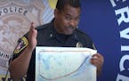 Bloomington Police Chief Booker Hodges held a map showing the area of a recent prostitution sting operation. 