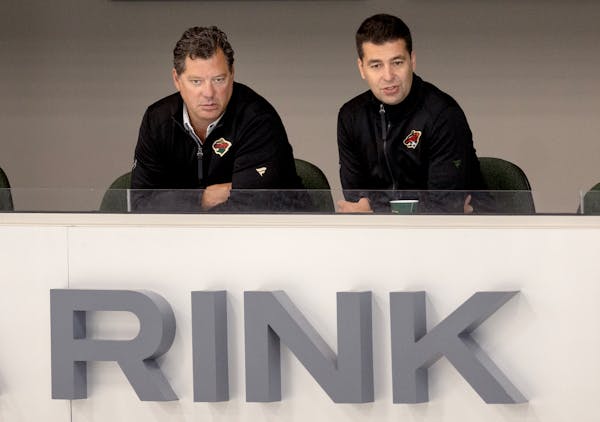 Bill Guerin, the Wild GM and president of hockey operations, and assistant general manager Mike Murray watched training camp Thursday.