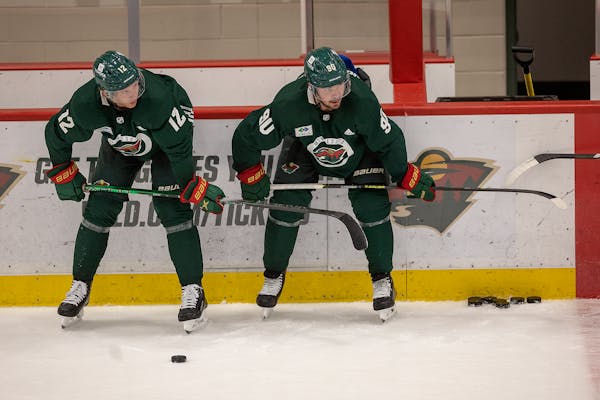 Matt Boldy and Marcus Johansson, right, took part in drills at Wild training camp on Thursday at Tria Rink.