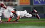 Twins third baseman Willi Castro dove into third base on a triple in the fourth inning Friday night at Target Field.