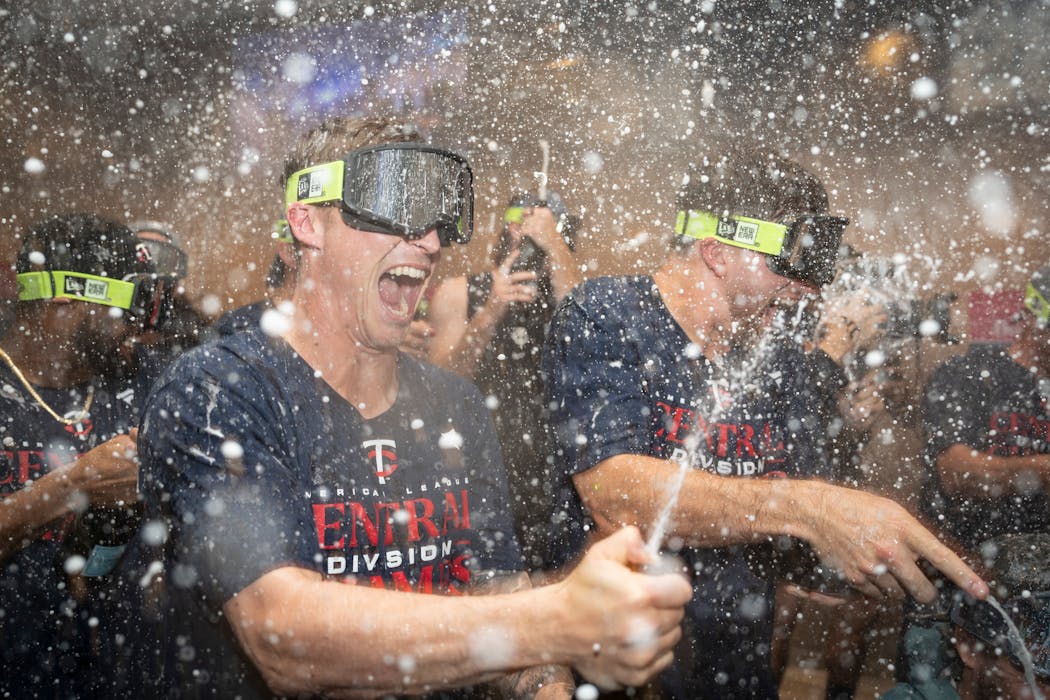 After troubles at the end of last season, it was nothing but bubbles in the Twins clubhouse Friday night after clinching the AL Central Division title.