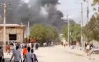 In this grab taken from video, smoke billows after an explosion in Beledweyne, Somalia, Saturday, Sept. 23, 2023. 