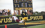Augsburg receiver Dominic Smith (11) pulled in a 13-yard touchdown at Gustavus Adolphus on Saturday, with the Gusties’ Isaiah Chambers defending on 